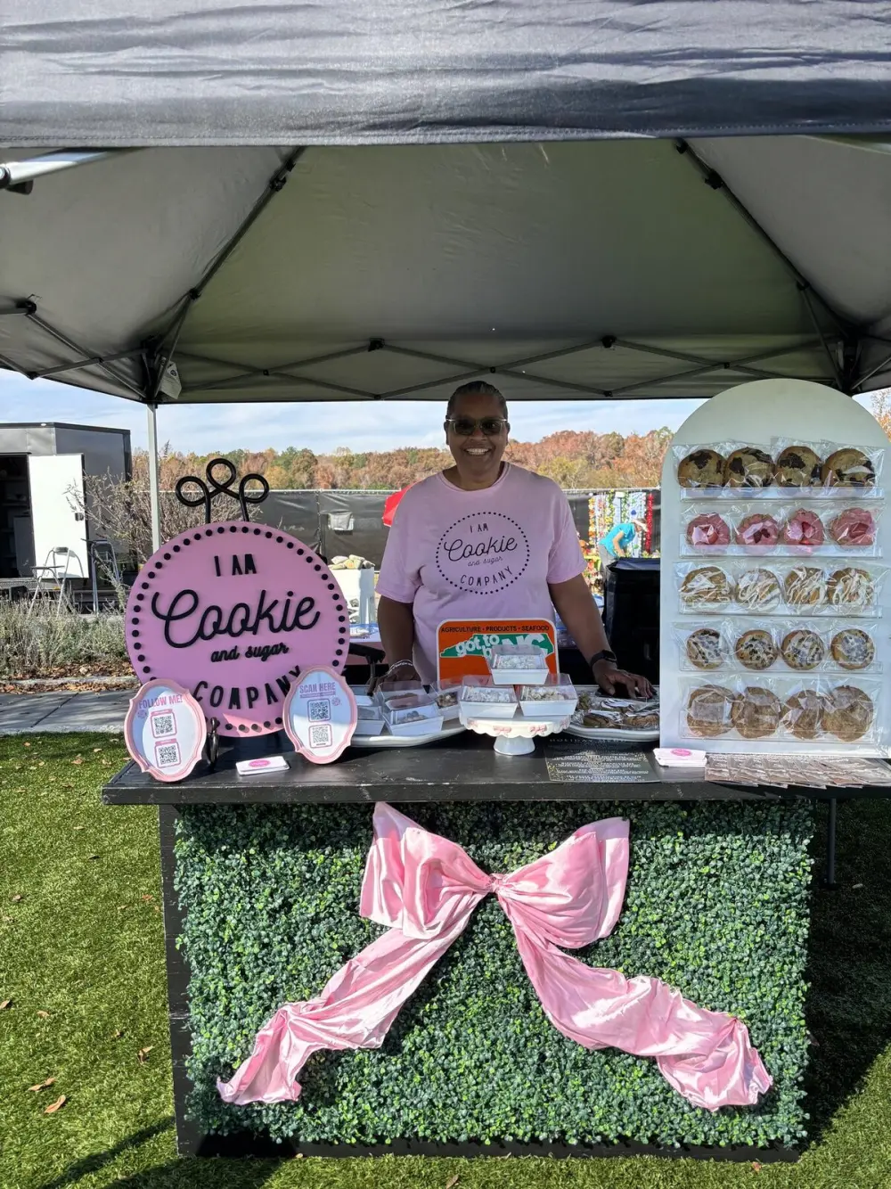 I Am Cookie and Sugar Co. team serving treats at a market